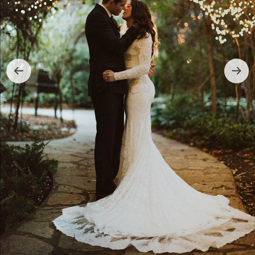 Olvi’s Style #2495 lace long sleeve wedding dress